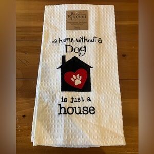 BNWT dish towel. Text saying, “A home without a dog is just a house.”